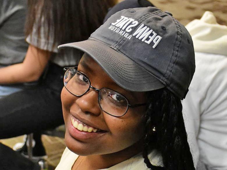 student smiling at camera